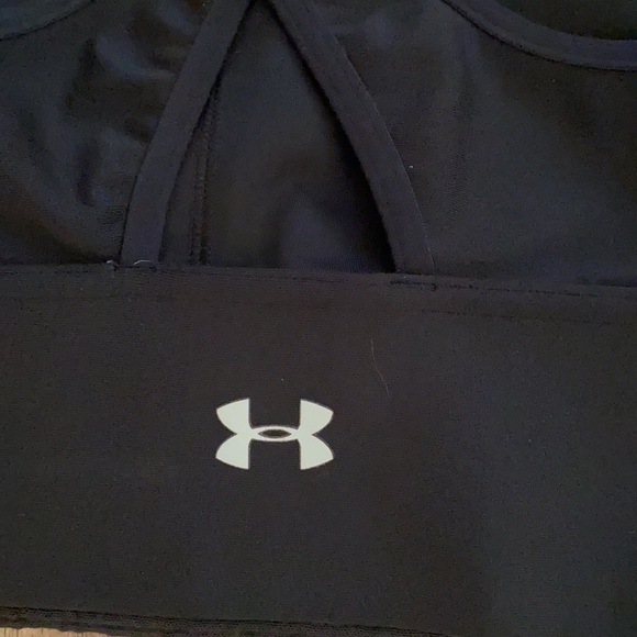 Under armour black sports bra with an adorable pocket in front. - Picture 6 of 8